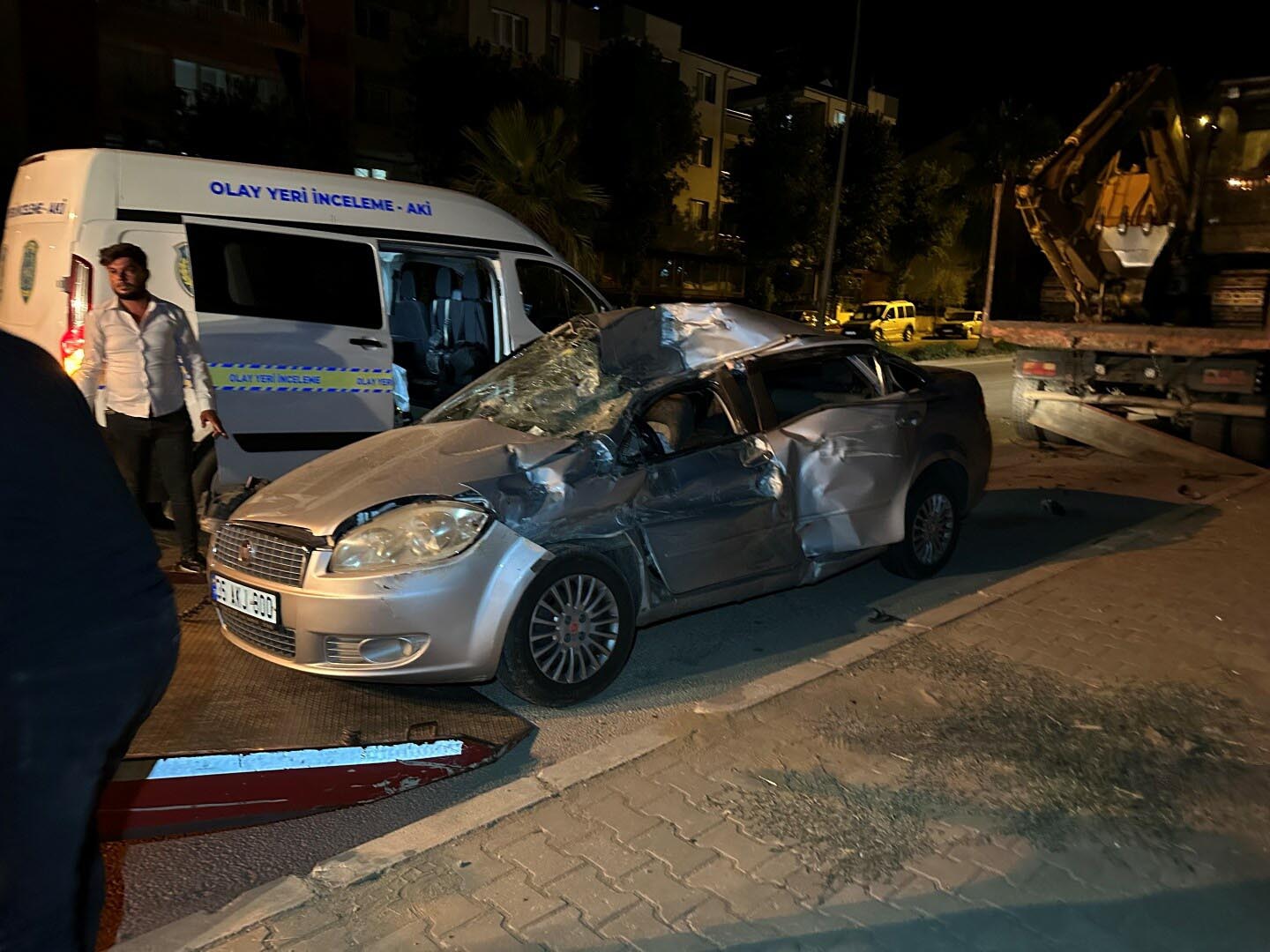 İzmir’de virajlı yolda savrulan otomobil, park halindeki kam